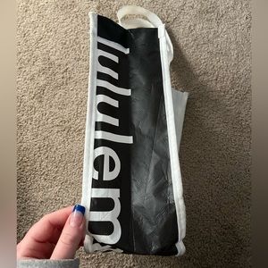small black and white lulu bag